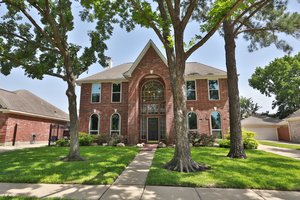 Welcome to 11214 Chestnut Woods Trail, your beautiful next home