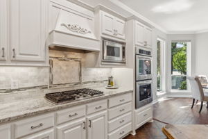 The KitchenAid appliances, along with gas cooktop, are sure to delight any chef. Every detail was thoughtfully addressed in this kitchen renovation.