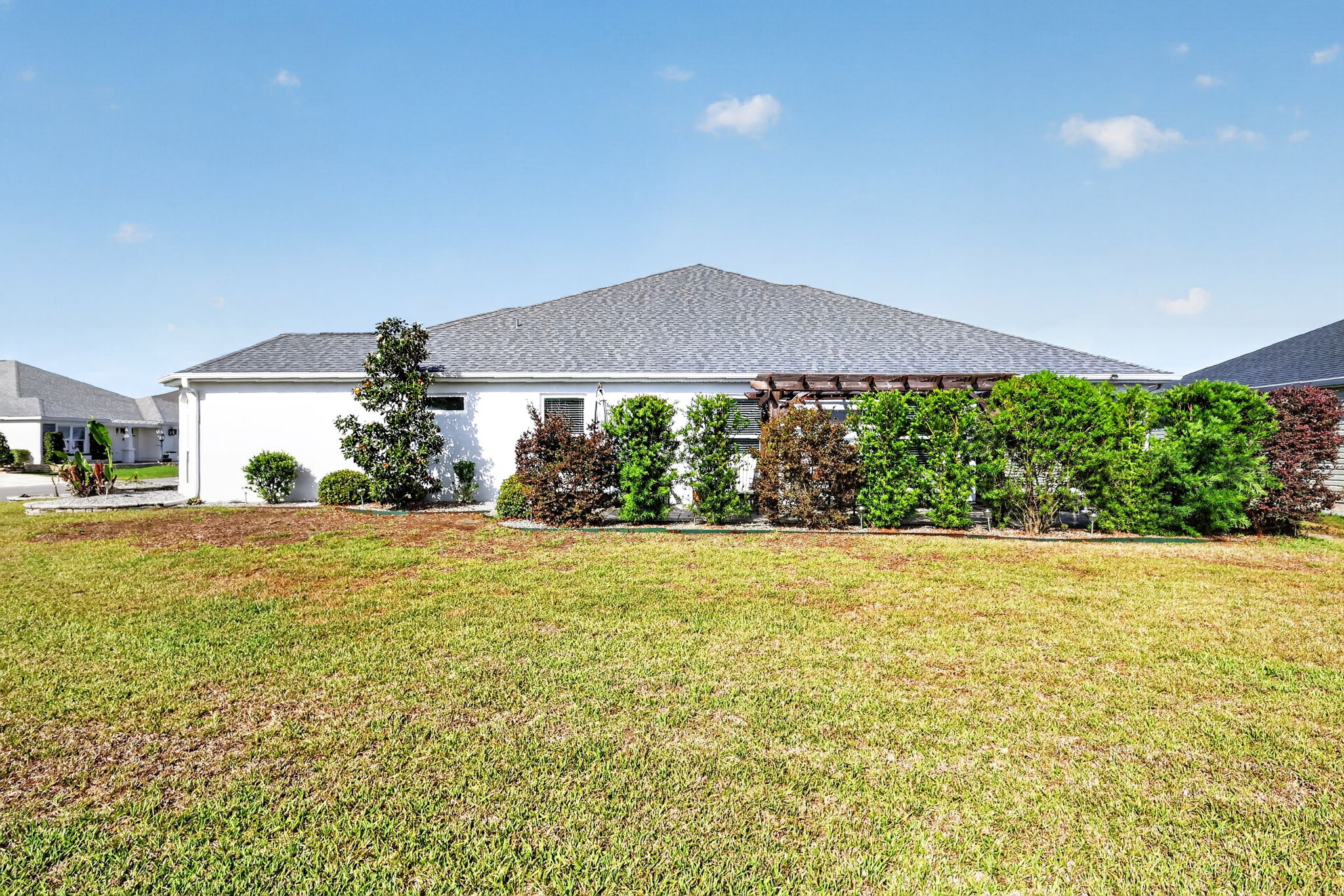 Side Elevation with Privacy Landscaping and ROOM FOR A POOL!