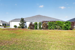 Side Elevation with Privacy Landscaping and ROOM FOR A POOL!