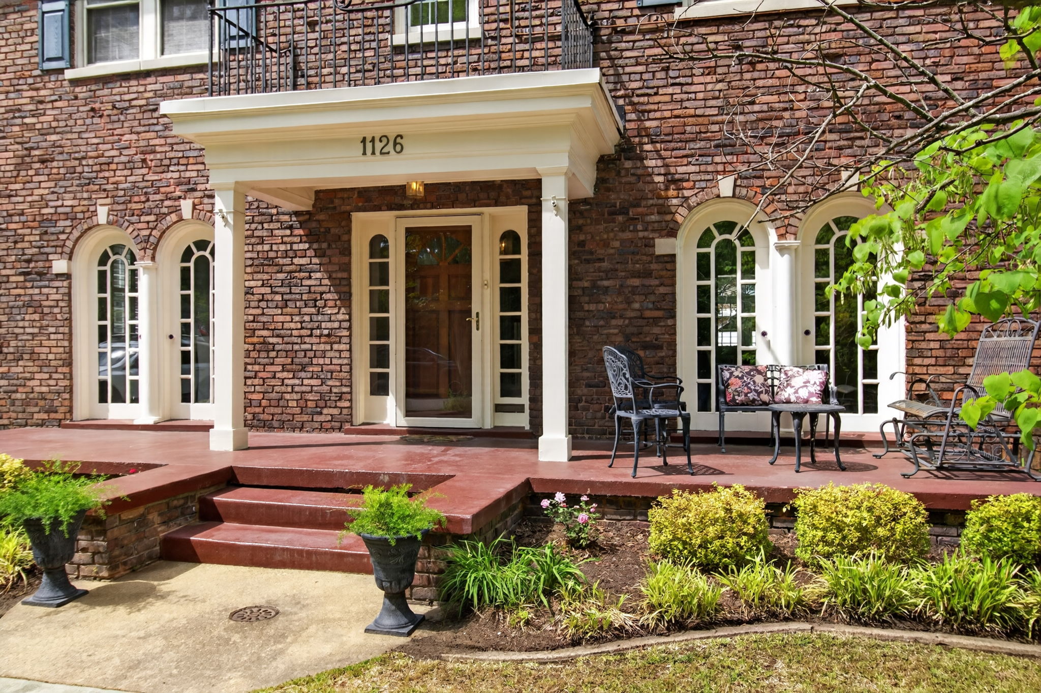 Fantastic front porch running the width of the home.