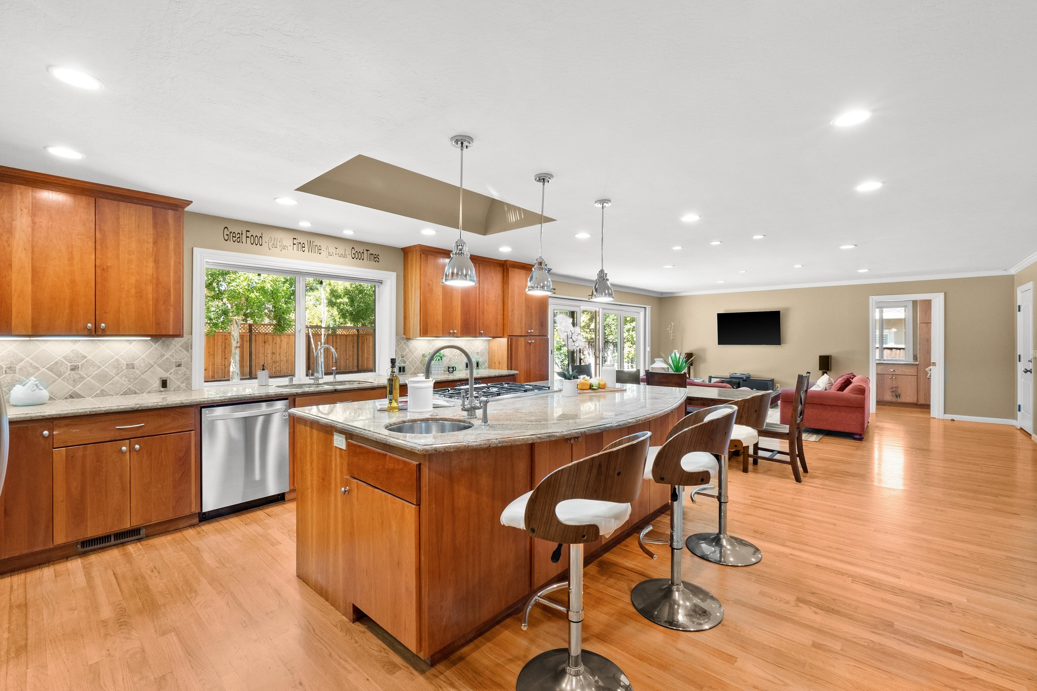 Kitchen with a large island and a sink.