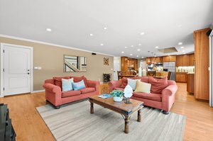 A calming living room sanctuary, offering a plush sofa and a peaceful coffee table.