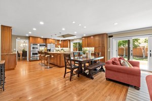 A harmonious living room, kitchen, and dining.