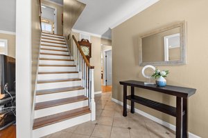 Explore the second floor via the stately staircase,  revealing four bedrooms, including an Private Master Suite.