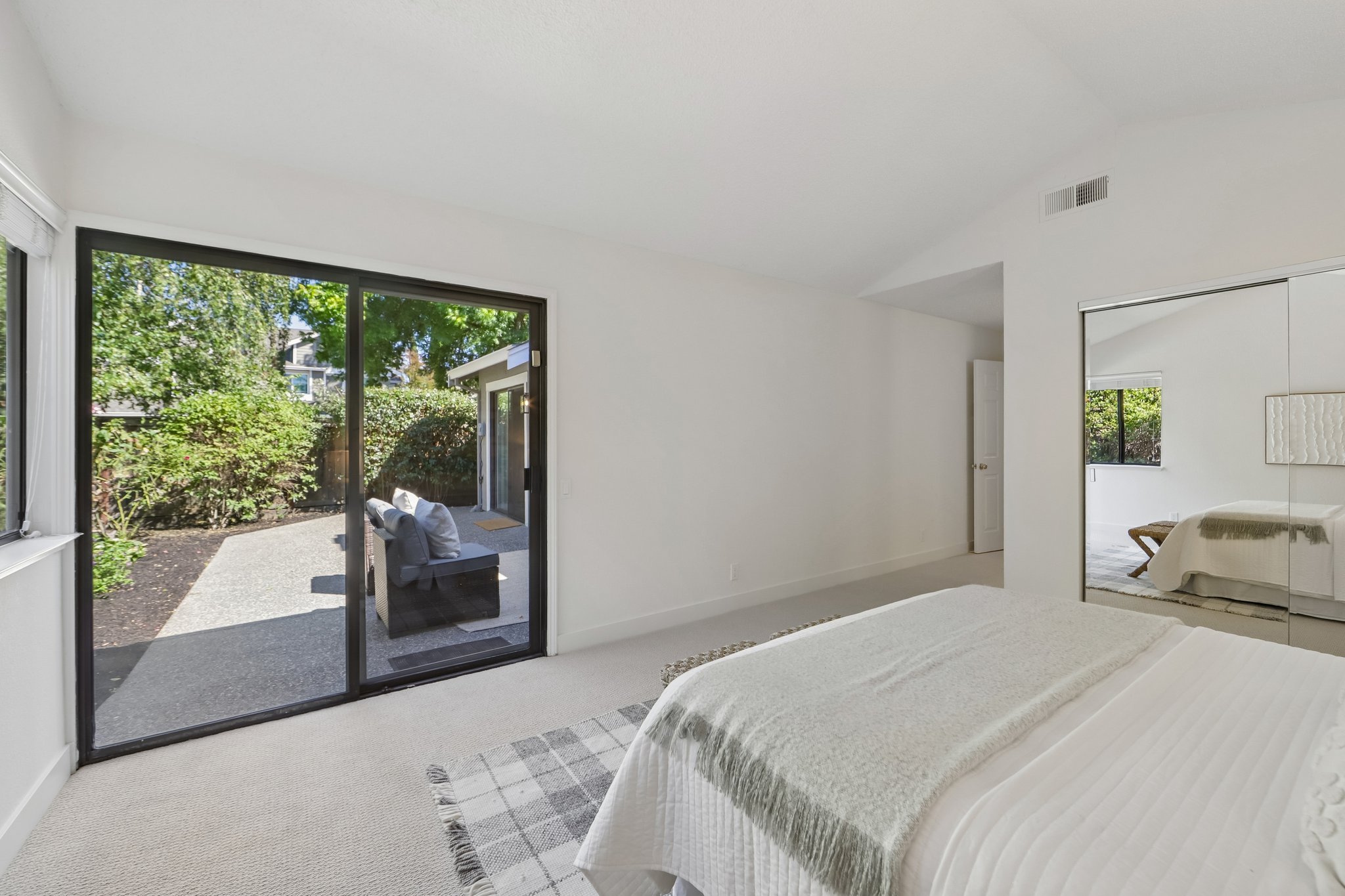 Primary Bedroom w/ its own exit to backyard