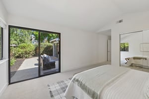 Primary Bedroom w/ its own exit to backyard