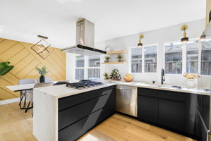 Herringbone style floor to ceiling backsplash