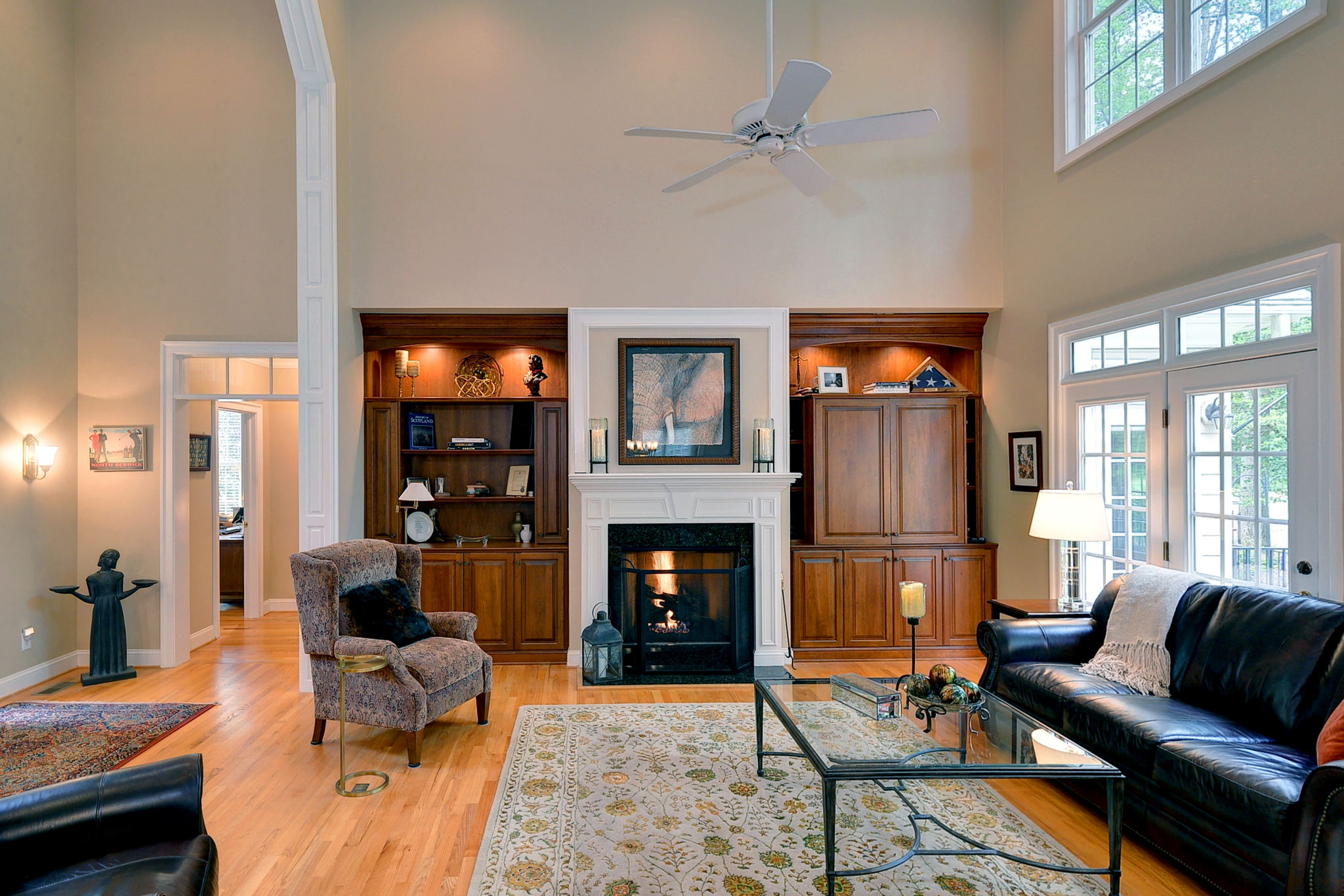 The family room boasts fine trim, custom built-ins and gas fireplace