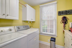 Large laundry/utility room with sink