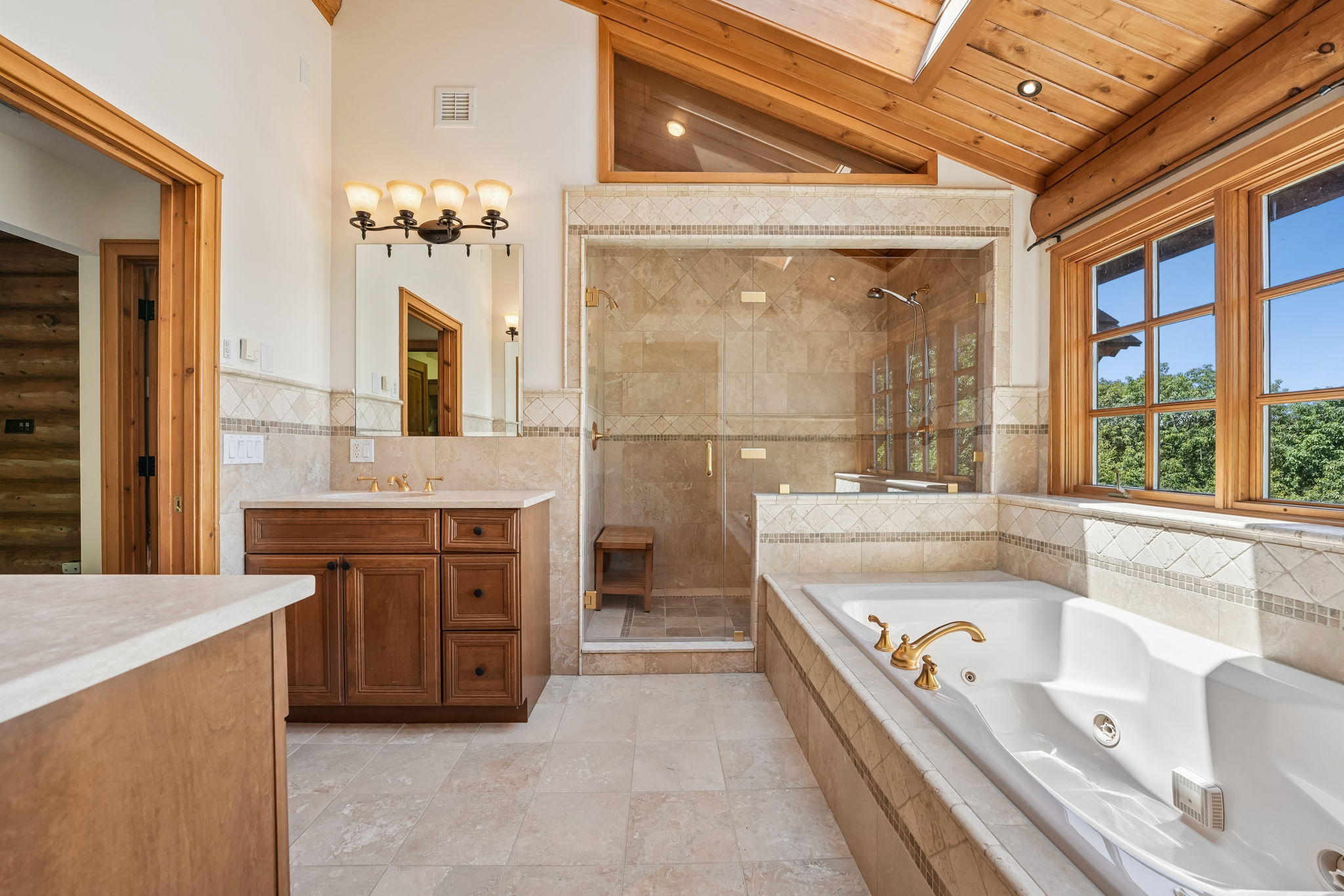 Primary ensuite bath with walk in shower