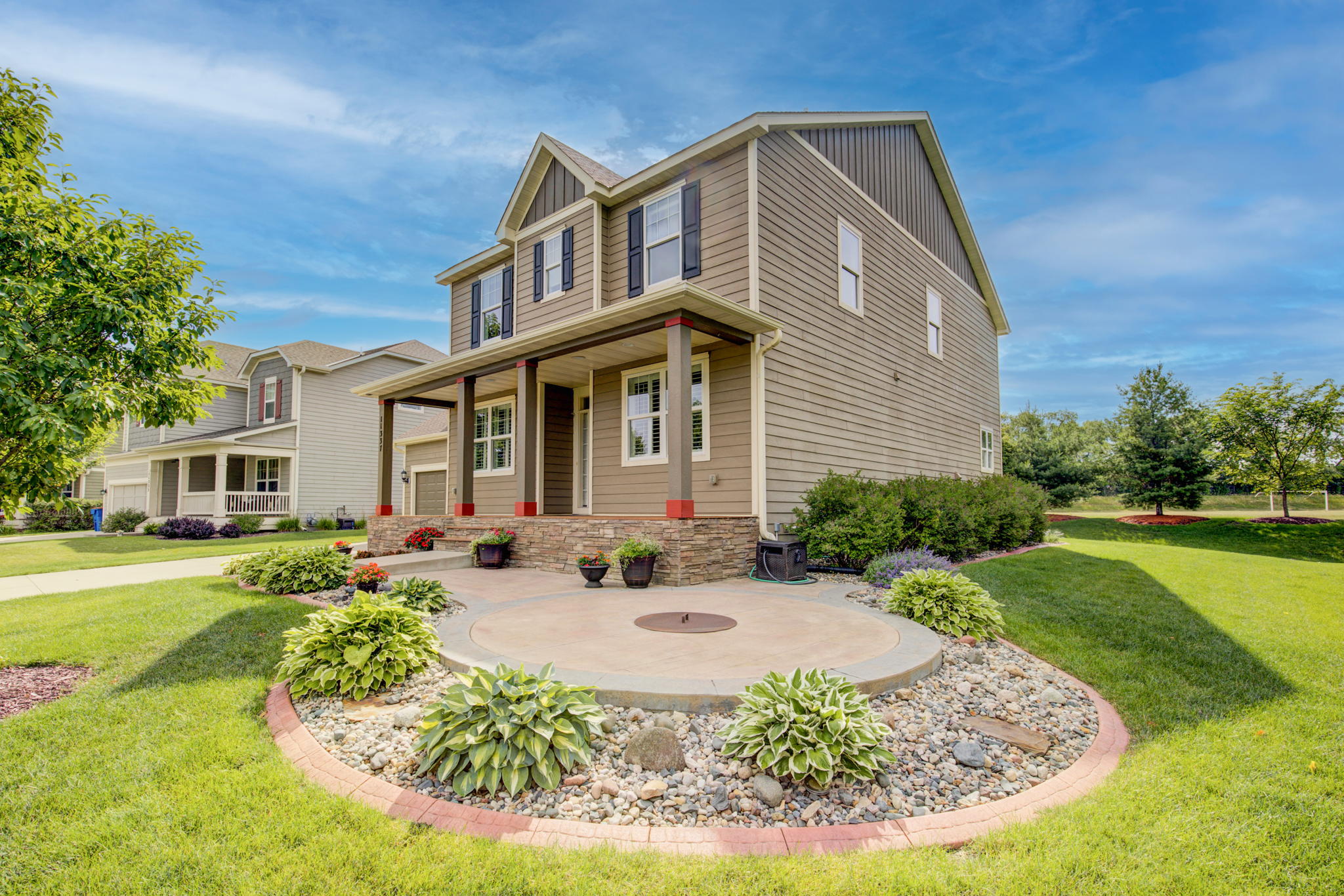 40 Exterior Front With Custom Fire Pit