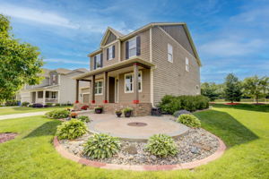 40 Exterior Front With Custom Fire Pit