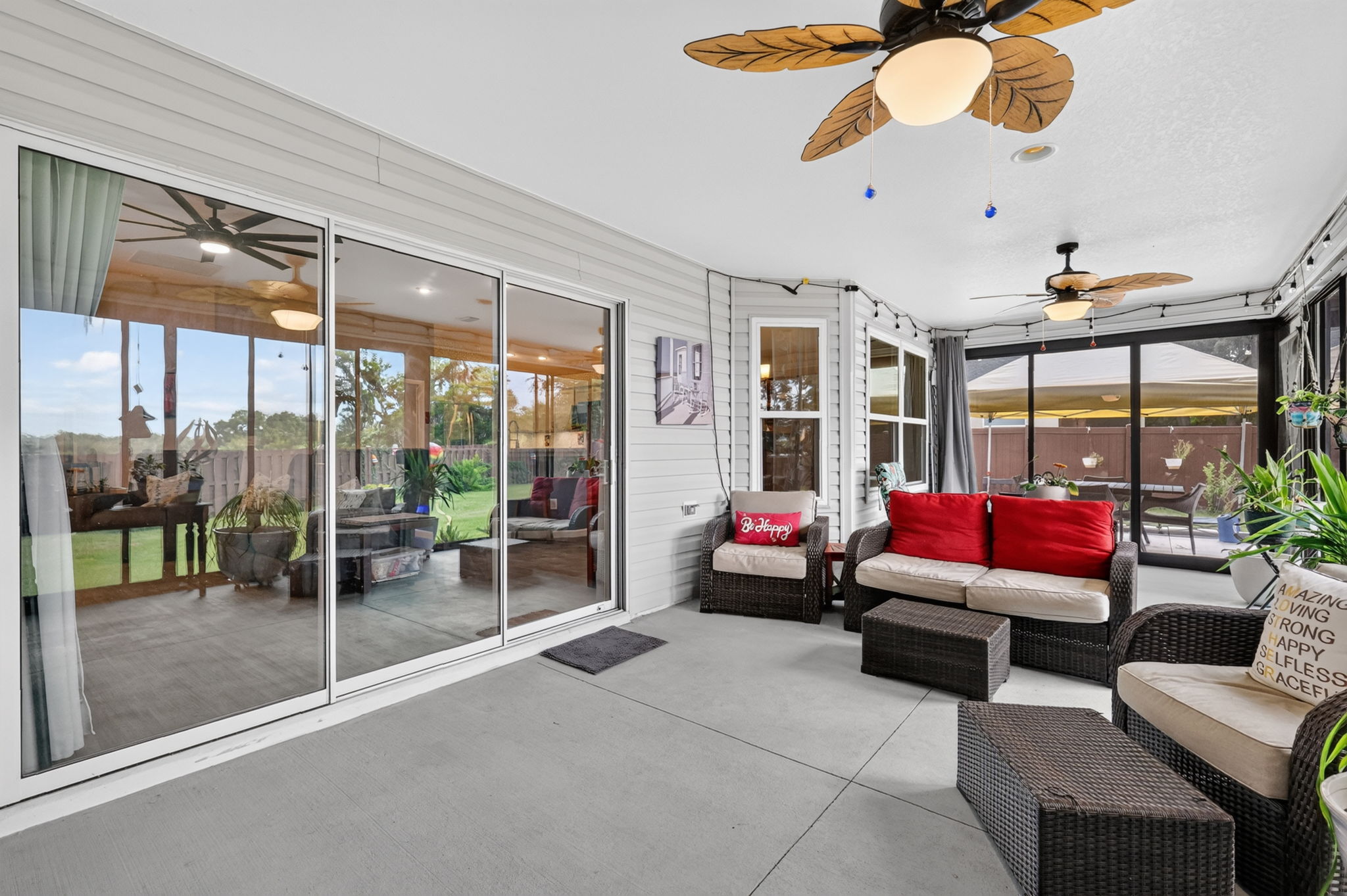 Glass-Enclosed Lanai with Patio