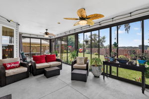 Glass-Enclosed Lanai with PRIVATE Fenced Yard