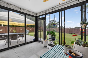 Glass-Enclosed Lanai with Patio and PRIVATE Fenced Yard