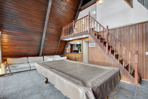 Living and Dining Rooms with Stairway to Second Floor