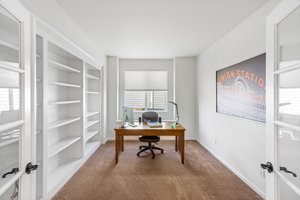 Office/Den with Built in Floor to Ceiling Cabinets