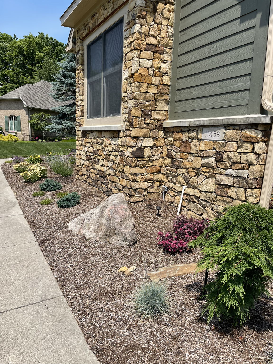 June 2025 after redoing front landscaping