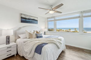 A large, sun-filled master suite with breathtaking oceanfront views ...