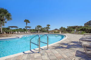 The Villa's enjoy an oceanfront resort-style pool ...