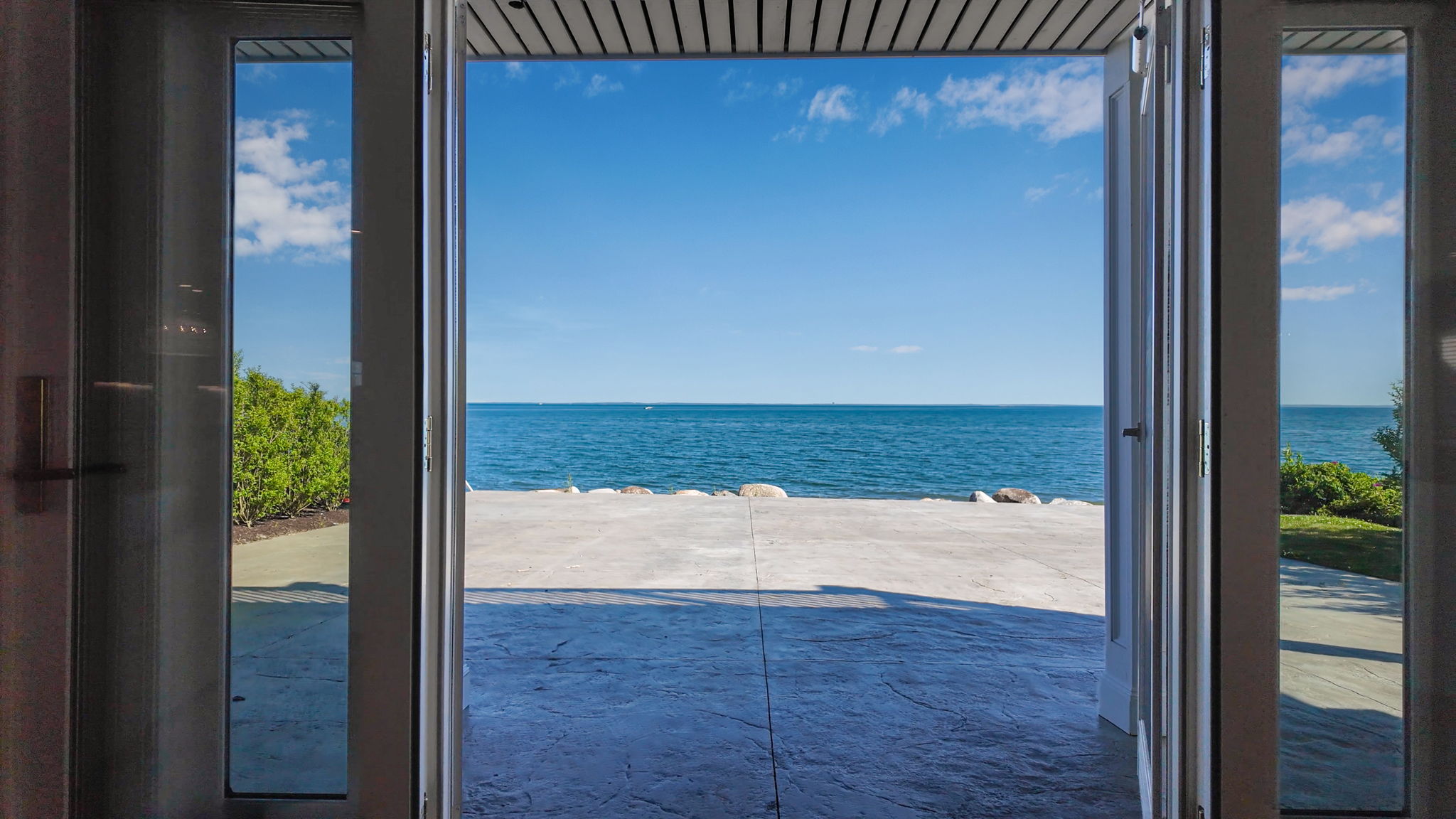 Step out to patio w/gorgeous water view