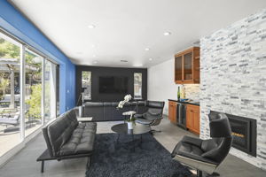 open floor plan with sitting area  opening to family room