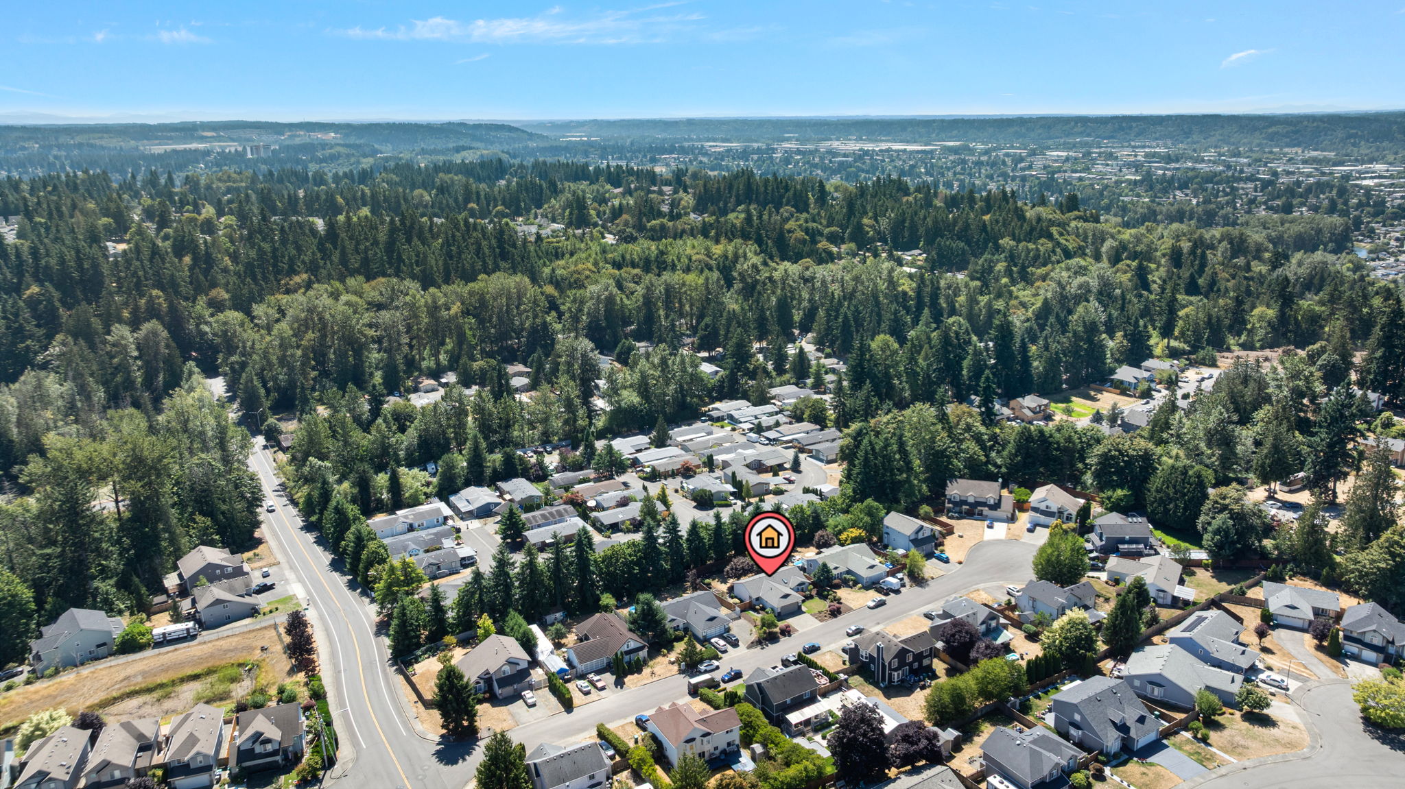 A peaceful neighborhood setting, surrounded by mature evergreens and Pacific Northwest beauty.