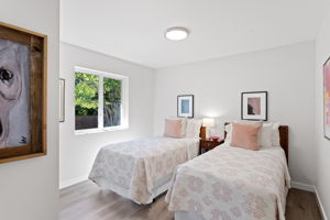 Cozy and inviting secondary bedroom, perfect for guests or shared use.