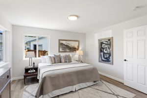 Neutral tones, updated lighting, and LVP flooring set a calm, modern tone.
