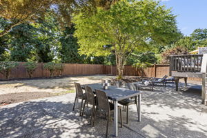 Spacious patio below provides plenty of room for alfresco dining or lounging.