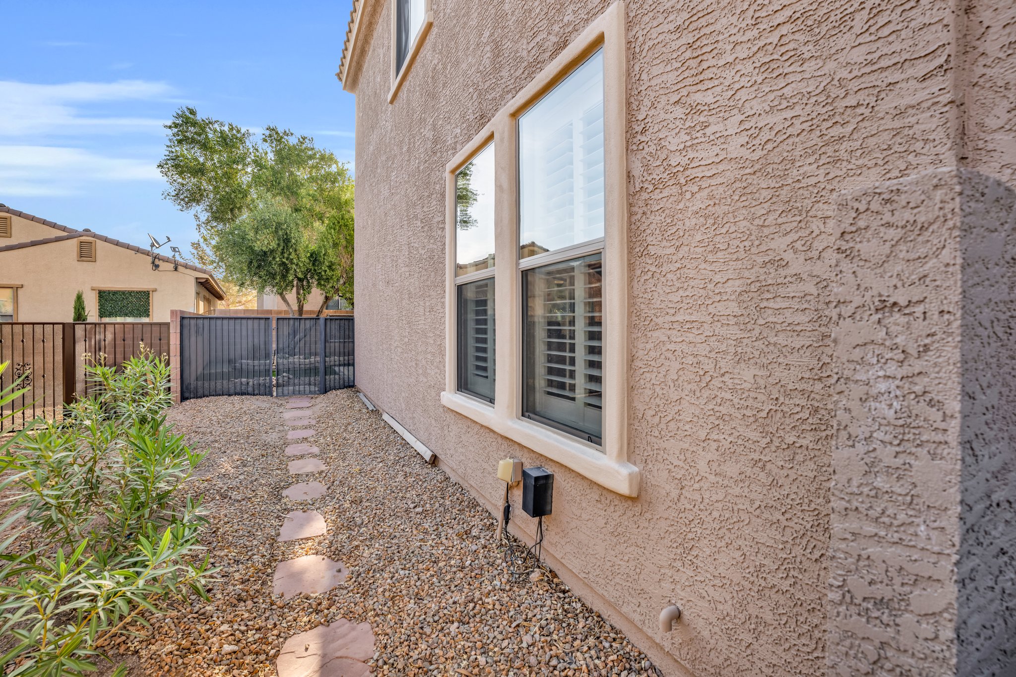 Gated Exterior Rear Yard Entrance