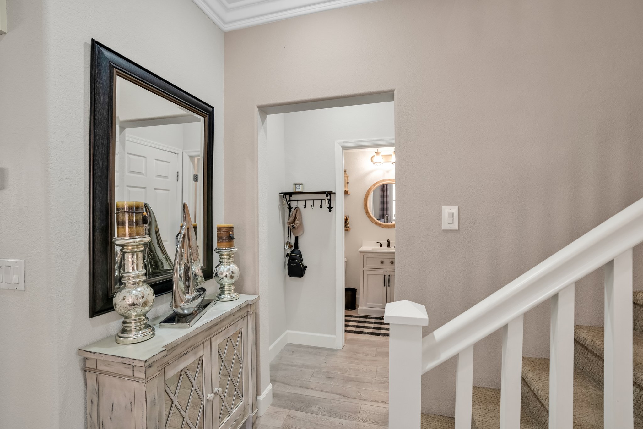 Stairway leading from hall to Garages