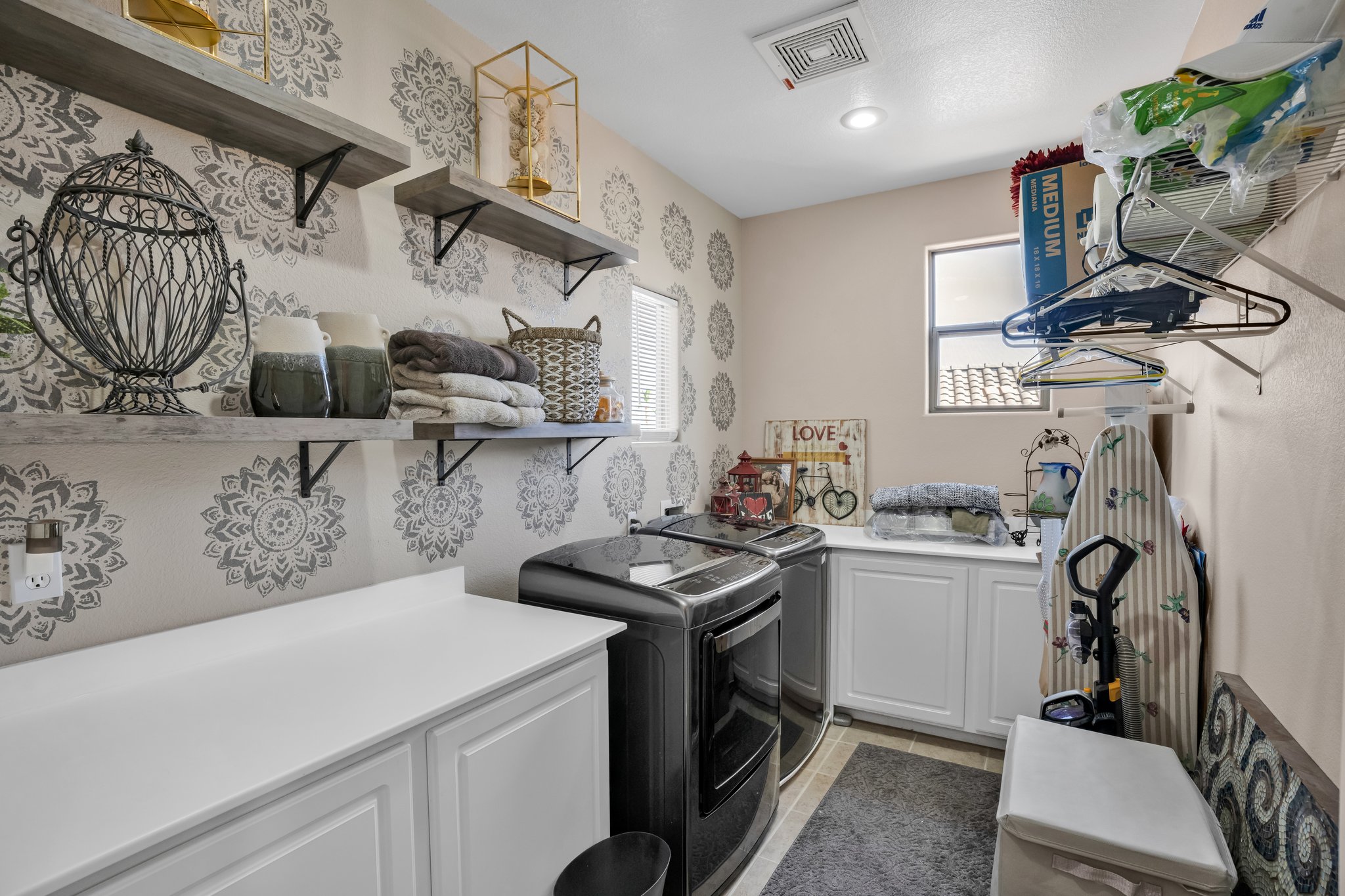 Oversized extended Laundry Room & custom cabinetry, Gas Dryer & Washer included with Full Price Offer!