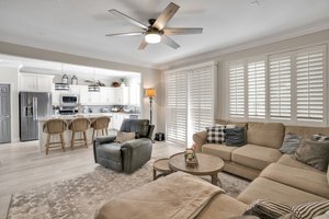 Living Room with Lighted Ceiling Remote Fan