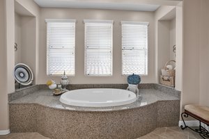 Private Soaking Tub surrounded custom granite