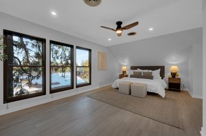 Primary Suite with Floor to Ceiling Windows