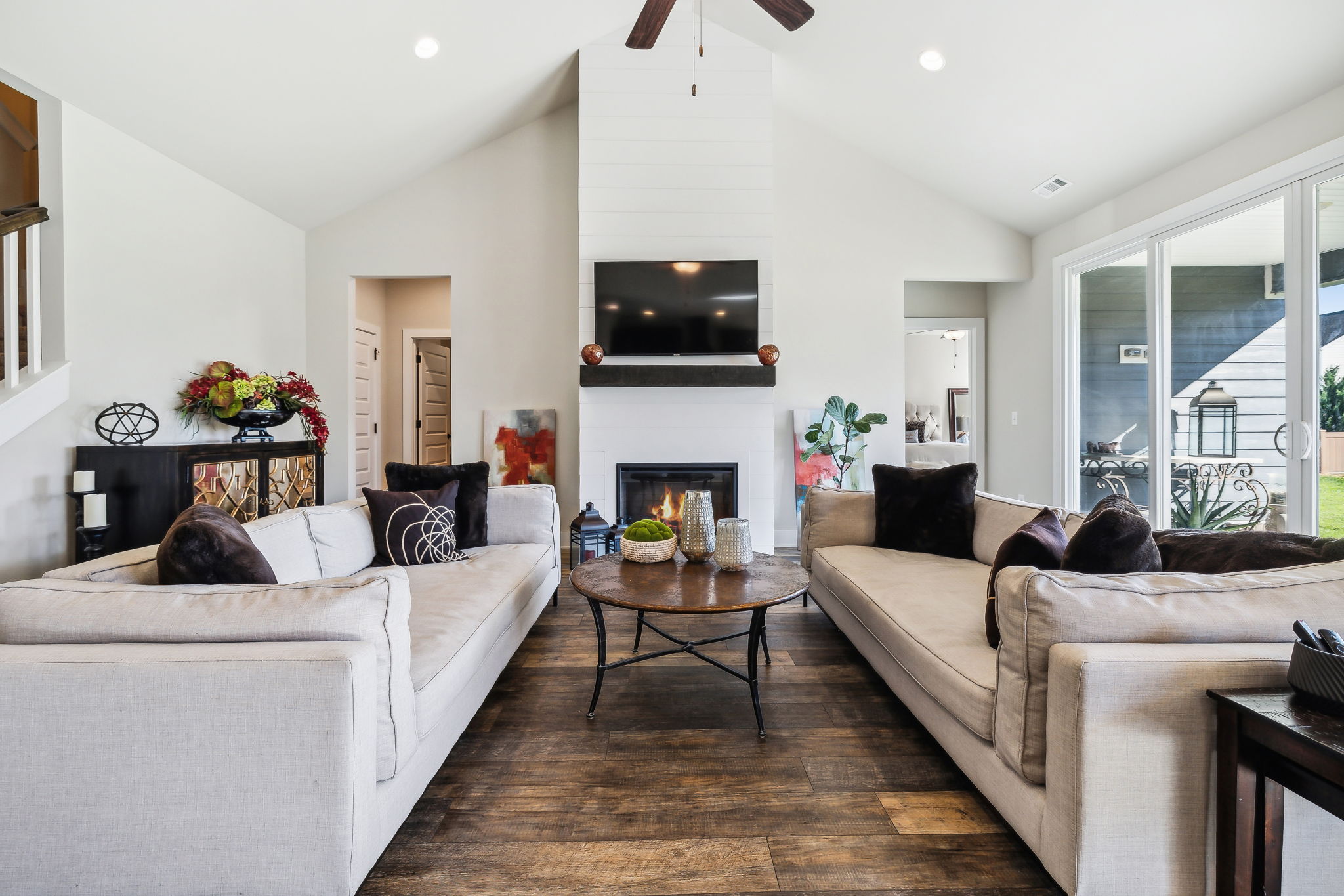 Vaulted ceiling, fireplace, bi-parting glass sliding doors