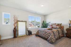 Huge guest bedroom up with lots of light and double closets