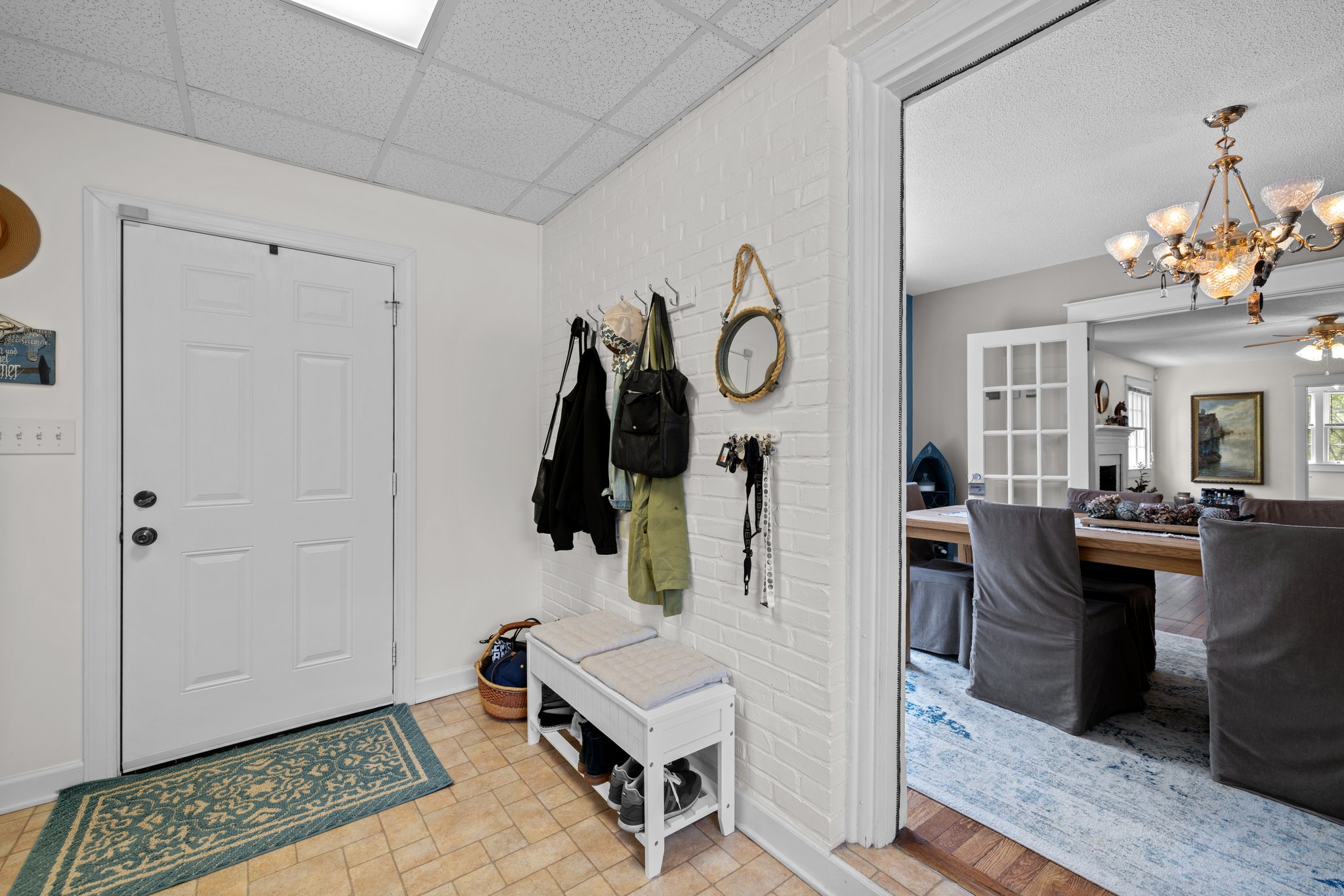Mudroom with access to the garage.