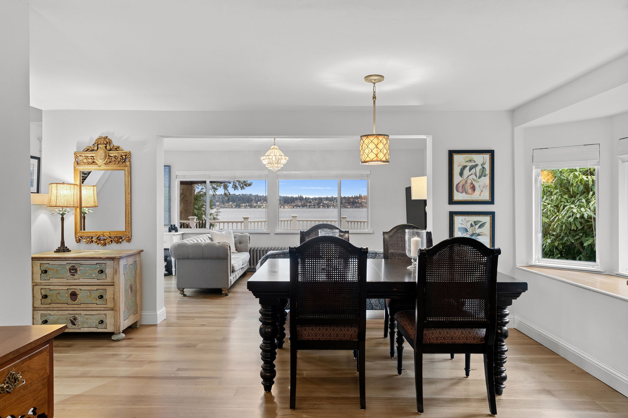 Imagine elegant dinners in this well-appointed dining room with a modern light fixture.