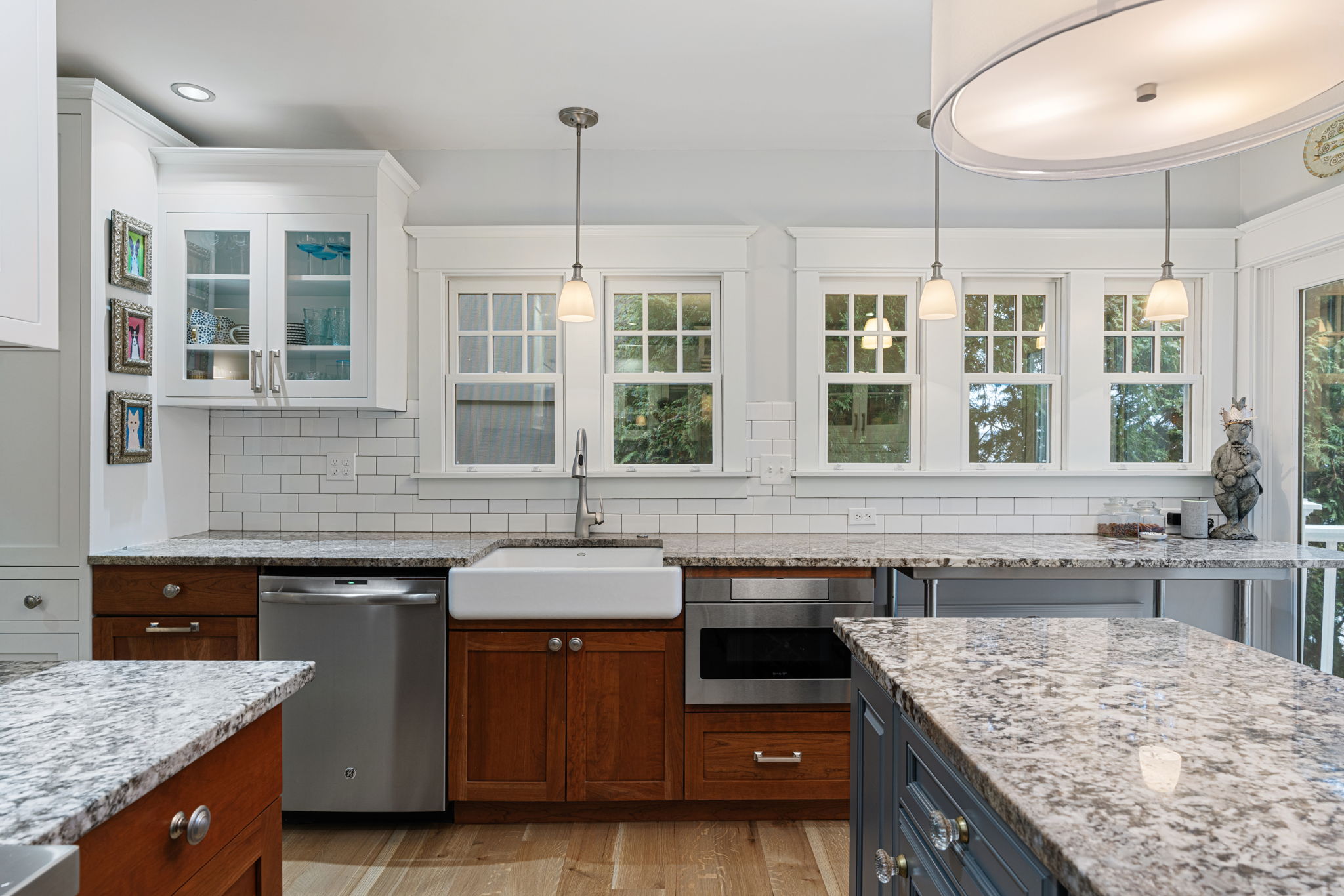 Gleaming granite countertops and stainless-steel appliances.