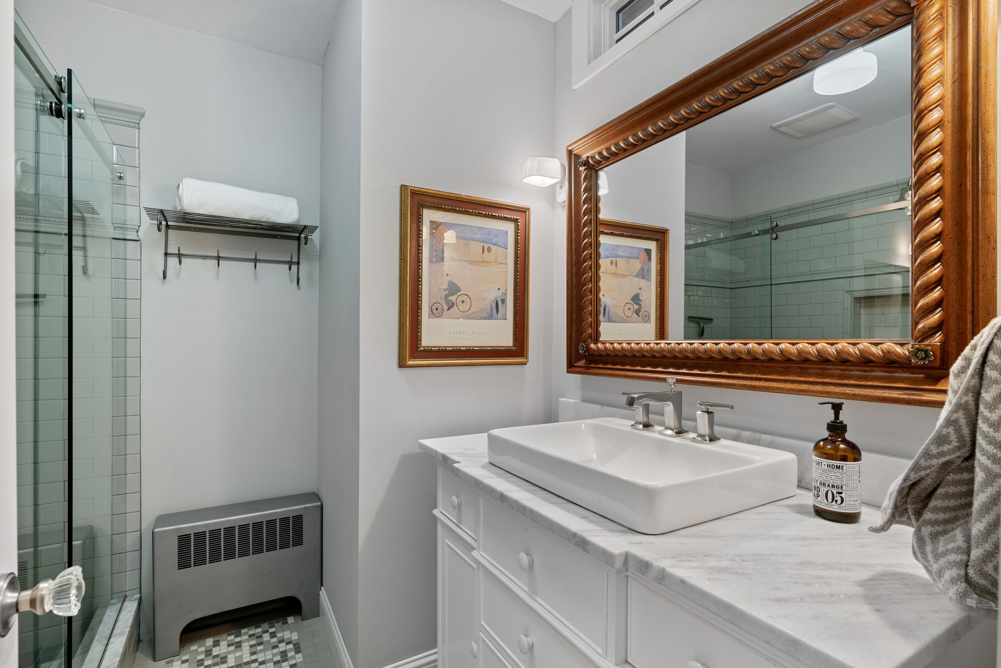 Fully remodeled bathroom with a beautiful walk-in shower.