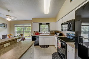 Kitchen with view of conservation lot