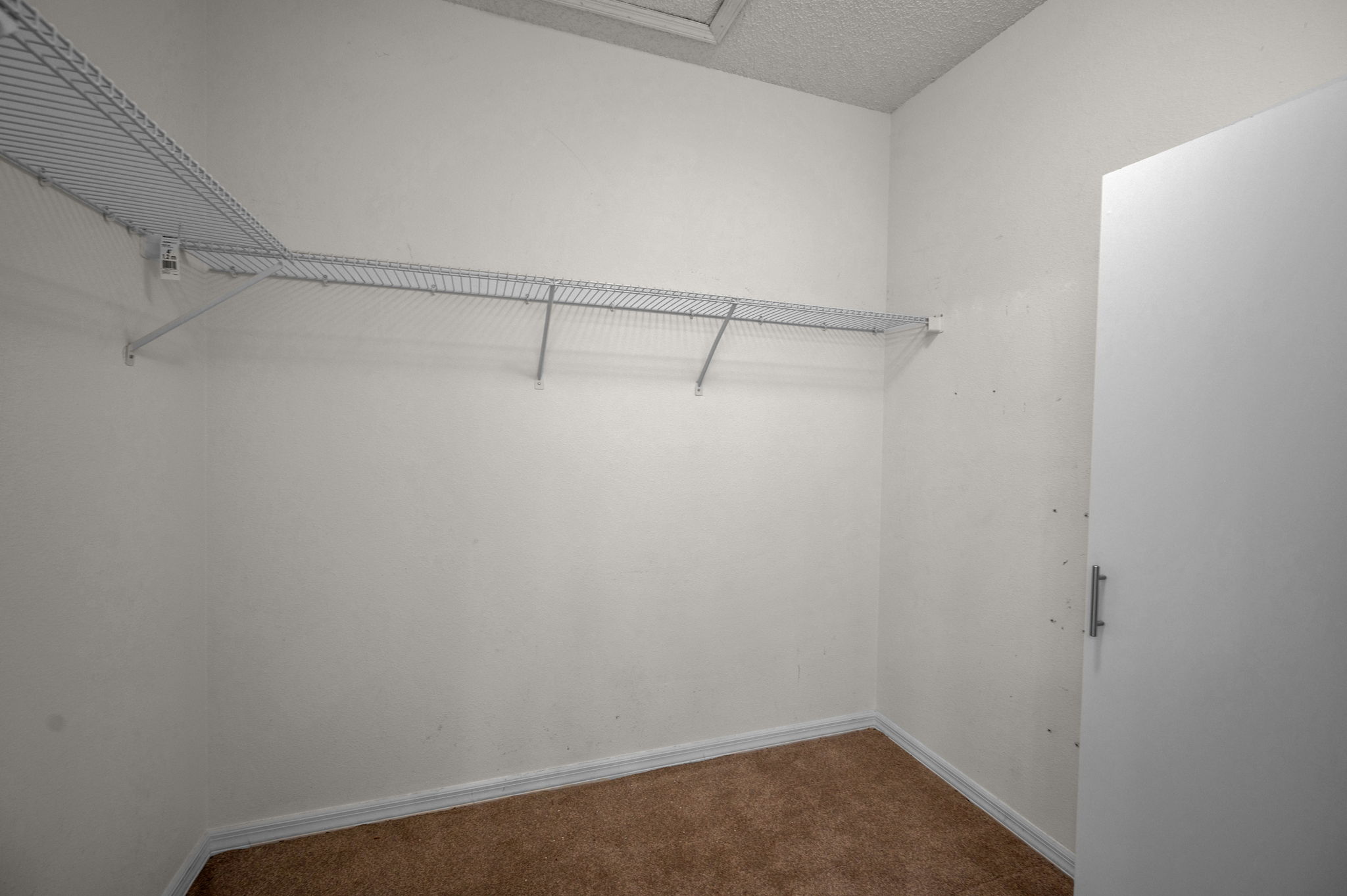 Primary Bedroom Walk-in Closet