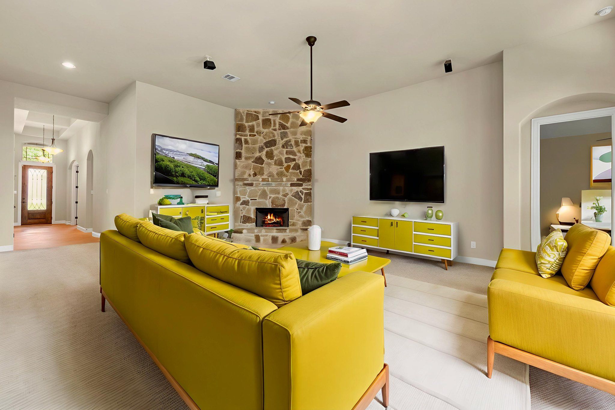 Living Room with Floor to Ceiling Stone Fireplace
