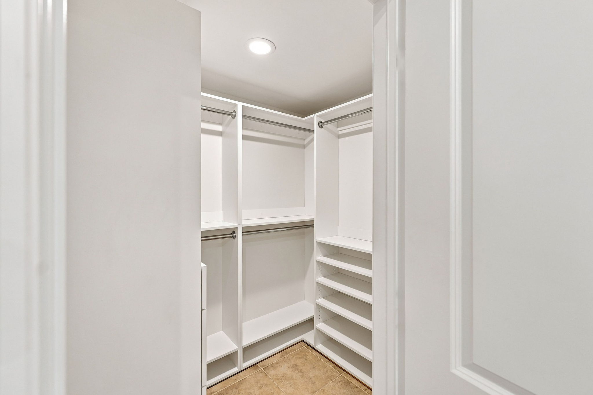 one of the Primary walk-in closets