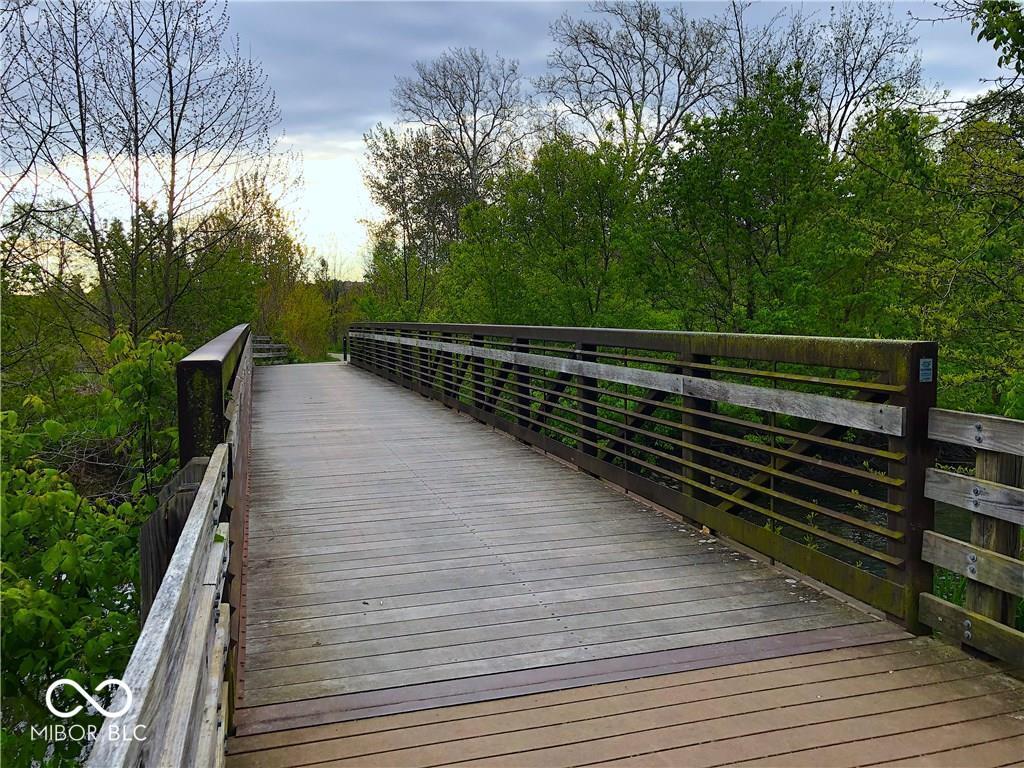 There is a nearly one mile walking path that connects two neighborhoods. It follows a meandering creek and is a great place for hiking, biking, bird watching
