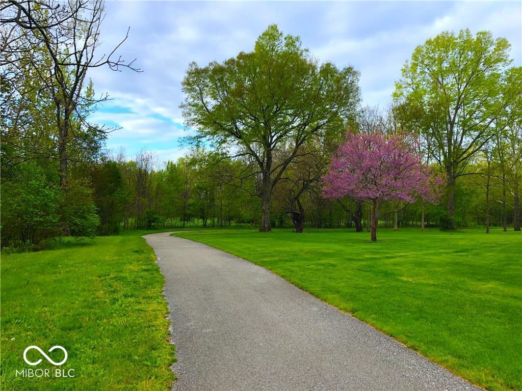 There is a nearly one mile walking path that connects two neighborhoods. It follows a meandering creek and is a great place for hiking, biking, bird watching