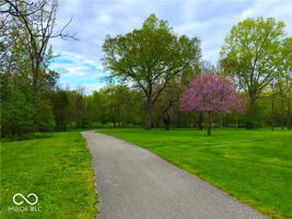 There is a nearly one mile walking path that connects two neighborhoods. It follows a meandering creek and is a great place for hiking, biking, bird watching
